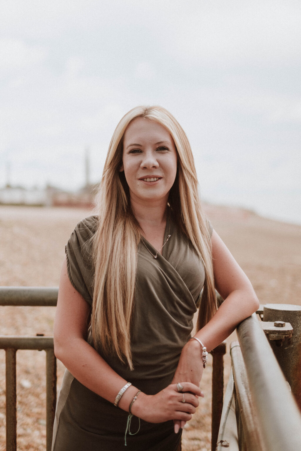 Danielle Hunter leaning on a railing on the seafront